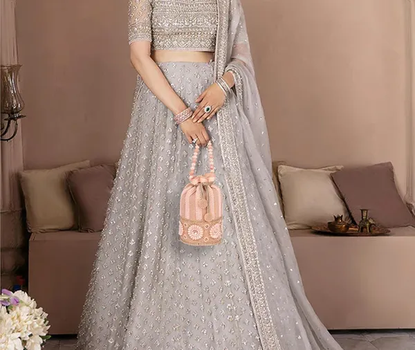 Peach_Drawstring_Closure_With_Crystal_Embellishments_Elegant_Pearl_Beaded_Potli_Bag_