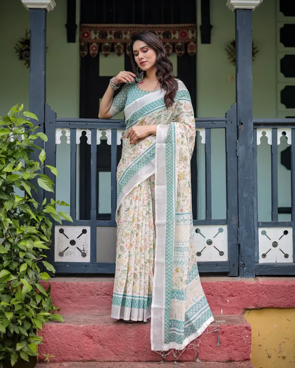 Elegant_Floral_Printed_Pure_Cotton_Linen_Saree_in_Ivory_with_Teal_Border_and_,_Tassels_on_Edges_With_Unstitched_Blouse