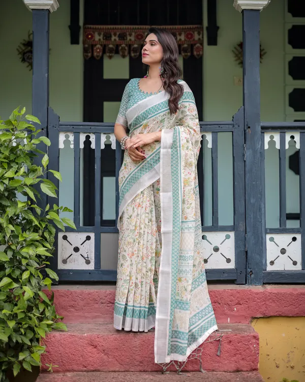 Elegant_Floral_Printed_Pure_Cotton_Linen_Saree_in_Ivory_with_Teal_Border_and_,_Tassels_on_Edges_With_Unstitched_Blouse