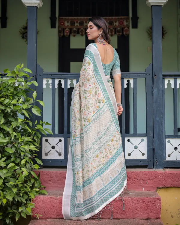 Elegant_Floral_Printed_Pure_Cotton_Linen_Saree_in_Ivory_with_Teal_Border_and_,_Tassels_on_Edges_With_Unstitched_Blouse