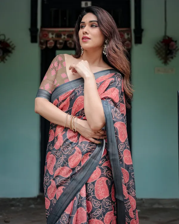 Charcoal_Black_Pure_Cotton_Linen_Saree_with_Leafy_Paisley_Print_And_Tassel_Detailing_With_Unstitched_Blouse