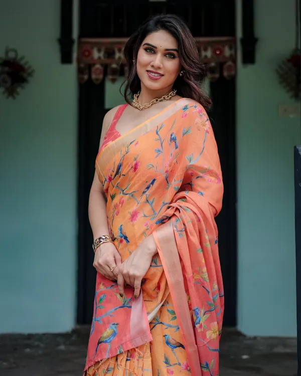 Peach_and_Orange_Pure_Cotton_Linen_Saree_with_Floral_and_Bird_Print_And_Tassel_Detailing_With_Unstitched_Blouse