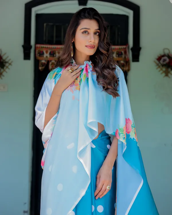 Sky_Blue_Satin_Georgette_Polka_Dot_Saree_with_Floral_Pallu_&_Teal__Handsfree_Draping_Loop_With_Unstitched_Blouse