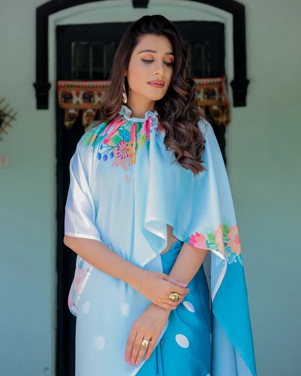 Sky_Blue_Satin_Georgette_Polka_Dot_Saree_with_Floral_Pallu_&_Teal__Handsfree_Draping_Loop_With_Unstitched_Blouse