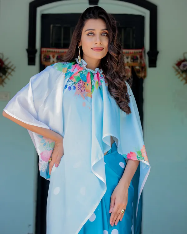 Sky_Blue_Satin_Georgette_Polka_Dot_Saree_with_Floral_Pallu_&_Teal__Handsfree_Draping_Loop_With_Unstitched_Blouse