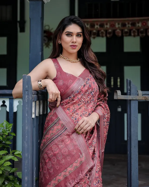 Rust_Red_Pure_Cotton_Linen_Saree_with_Floral_Block_Print_And_Tassel_Detailing_With_Unstitched_Blouse