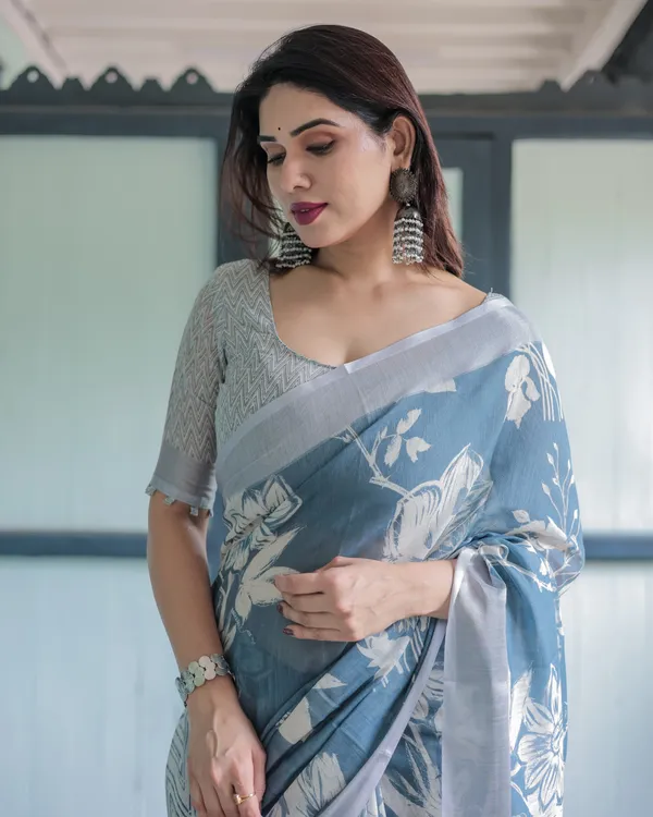 Pastel_Blue_Floral_and_Geometric_Printed_Cotton_Linen_Saree_and_Tassel_Edges_With_Unstitched_Blouse