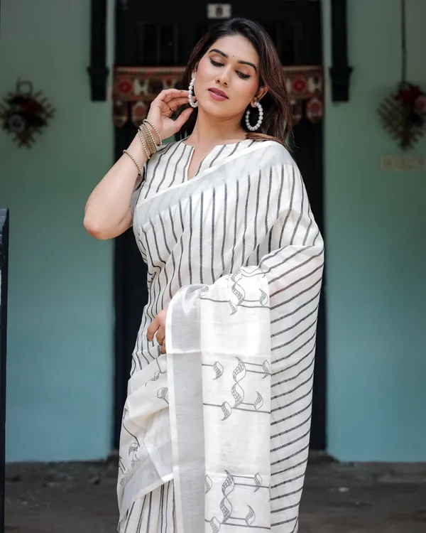 White_and_Black_Pure_Cotton_Linen_Saree_with_Striped_Pattern_And_Tassel_Detailing_With_Unstitched_Blouse