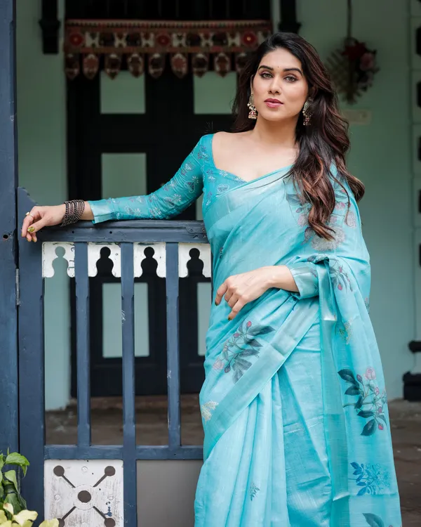 Aqua_Blue_Pure_Cotton_Linen_Saree_with_Floral_Design_And_Tassel_Detailing_With_Unstitched_Blouse