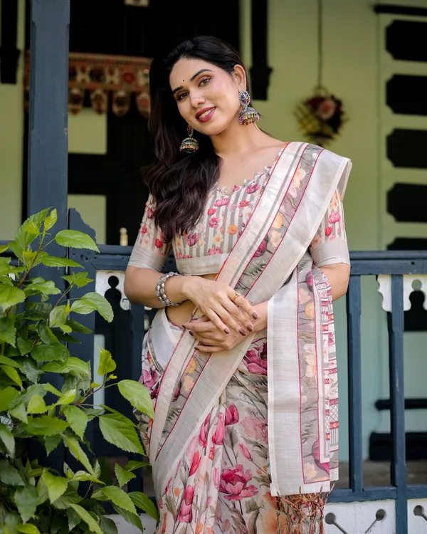 Elegant_Floral_Print_Pure_Cotton_Linen_Saree_in_Ivory_with_Multicolor_Florals_and_Tassels_With_Unstitched_Blouse