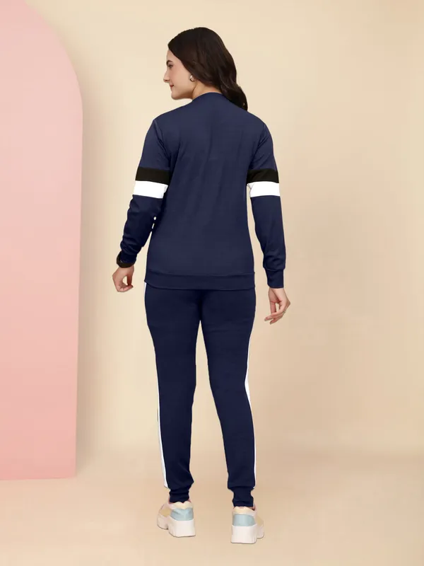 Women's_Navy_Blue_Athletic_Tracksuit_Set_with_Long_Sleeve_Sweatshirt_Featuring_Black_and_White_Horizontal_Stripes_and_Matching_Navy_Blue_Jogger_Pants_with_Black_Side_Stripes,_Perfect_for_Casual_Wear_and_Workouts
