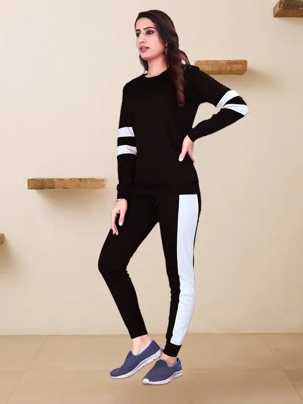 Women’s_Stylish_Black_Solid_Track_Suit_with_White_Stripe_Detailing_–_Full_Sleeve_Top_&_Slim_Fit_Track_Pants_Set