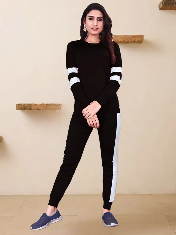Women’s_Stylish_Black_Solid_Track_Suit_with_White_Stripe_Detailing_–_Full_Sleeve_Top_&_Slim_Fit_Track_Pants_Set