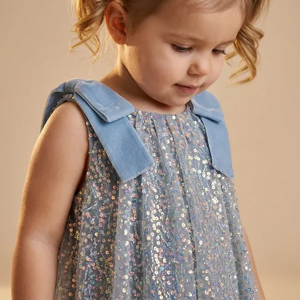 Grey_Cotton_Sparkling_Silver_Party_Dress_With_Blue_Bow_Accents_For_Girls