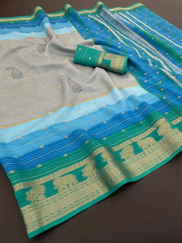 Blue_And_Teal_Printed_Ikkat_Jacquard,_Silk_Blend_Saree