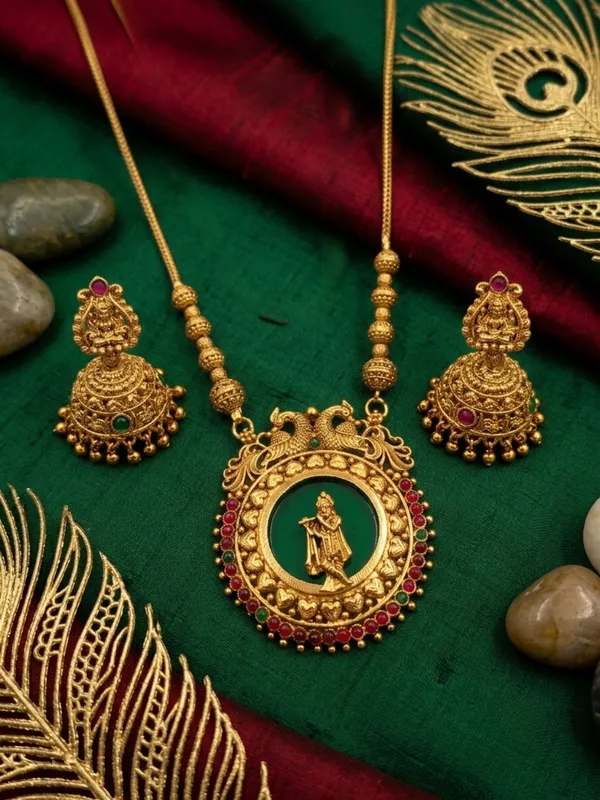 Antique_Gold_Plated_Krishna_Pendant_Chain_Set_with_Laxmi_Jhumka_Earrings_|_Green_Enamel_&_Ruby_Kundan_Jewelry
