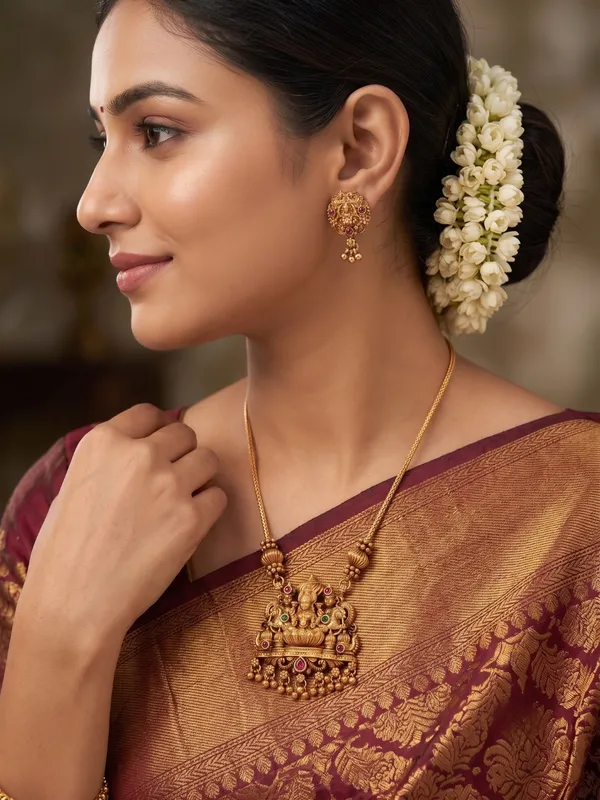 Divine_Lakshmi_Motif_Antique_Gold_Pendant_Set_with_Matching_Stud_Earrings