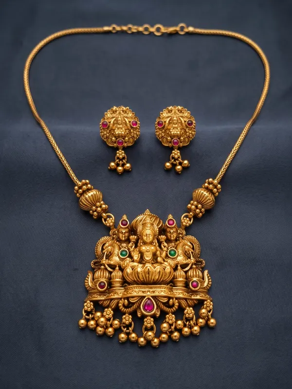 Divine_Lakshmi_Motif_Antique_Gold_Pendant_Set_with_Matching_Stud_Earrings