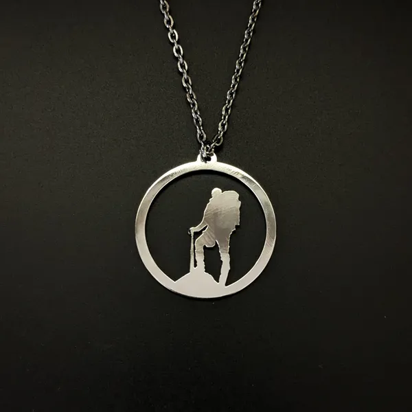 Steel_White_Adventure_Man_Metal_Pendant_(12_Inch)