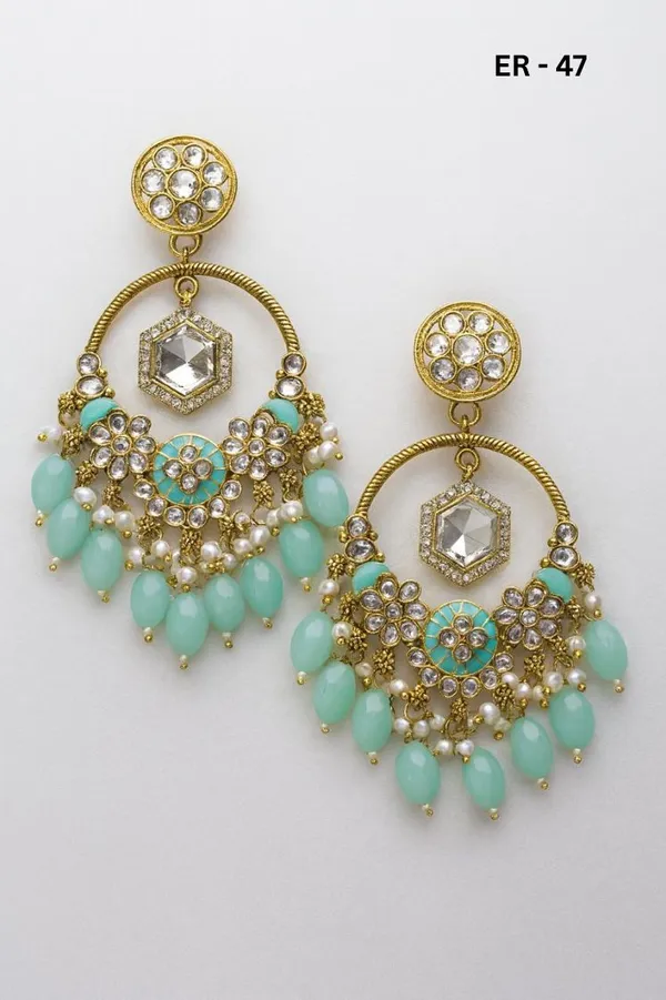 Premium_Gold-Toned_Chandbali_Jhumka_Earrings_Featuring_Sparkling_Kundan_Stones_and_Elegant_Pearl_Tassels.Ideal_for_Bridal_Looks_and_Grand_Festive_Occasions