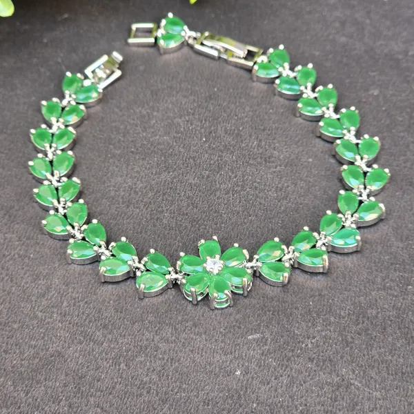 Green_Stainless_Steel_Emerald,_American_Diamond,_Pink_Spinel_Bracelet_For_Women