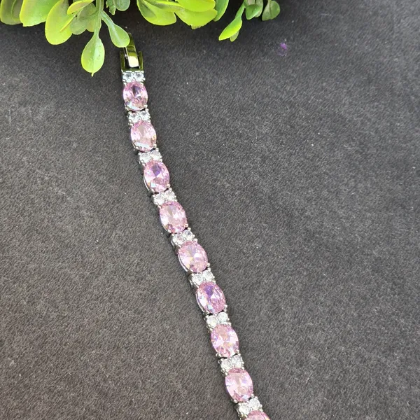 Pink_Stainless_Steel_Topaz_With_American_Diamond_Oval_Shaped_Bracelet