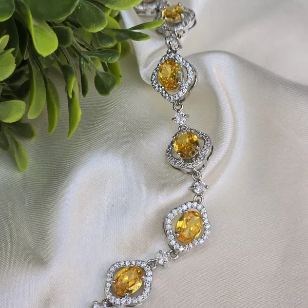 Yellow_Stainless_Steel_Anti-Tarnish_&_Water_Resistant_Topaz_With_American_Diamond_Oval_Shaped_Bracelet_For_Women