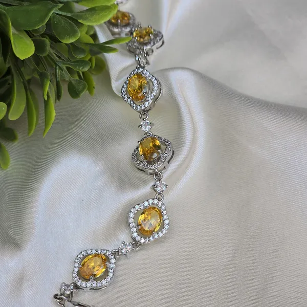 Yellow_Stainless_Steel_Anti-Tarnish_&_Water_Resistant_Topaz_With_American_Diamond_Oval_Shaped_Bracelet_For_Women