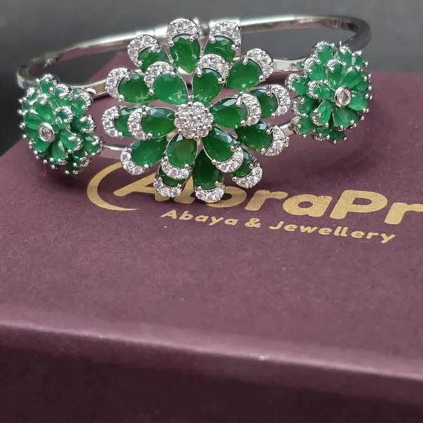 Green_Stainless_Steel_Emerald_With_American_Diamond_Flower_Design_Stone_Bangle
