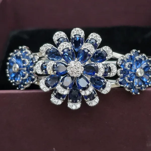 Blue_Stainless_Steel_Sapphire_With_American_Diamond_Flower_Design_Stone_Bangle