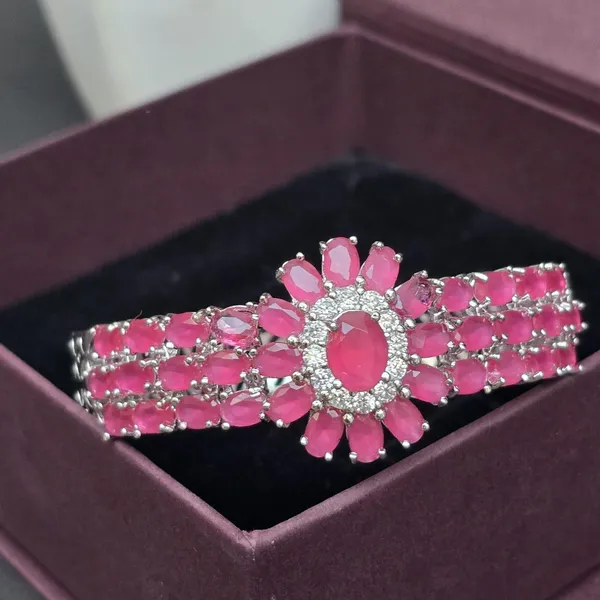Pink_Stainless_Steel_Ruby_With_American_Diamond_Flower_Design_Stone_Bangle