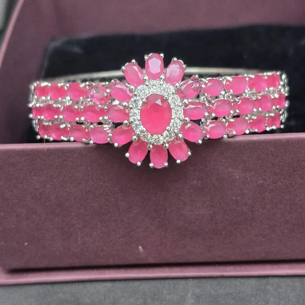 Pink_Stainless_Steel_Ruby_With_American_Diamond_Flower_Design_Stone_Bangle