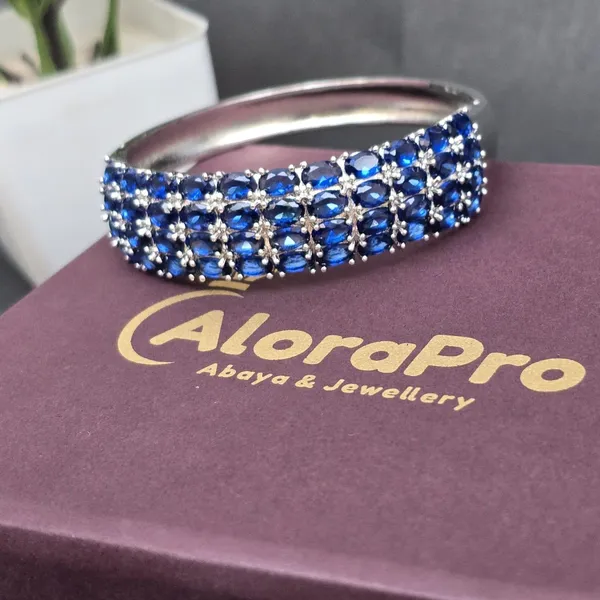 Blue_Stainless_Steel_Sapphire_Oval_Design_Stone_Bangle