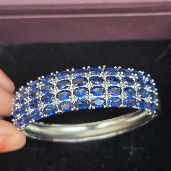 Blue_Stainless_Steel_Sapphire_Oval_Design_Stone_Bangle