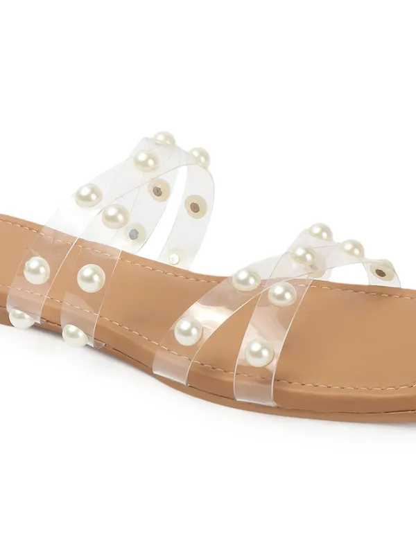 Elegant_slip-on_sandals_with_pearl-studded_soft_padded_insole,_and_large_decorative_front.