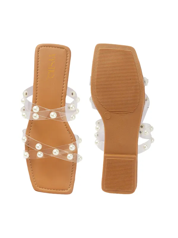 Elegant_slip-on_sandals_with_pearl-studded_soft_padded_insole,_and_large_decorative_front.