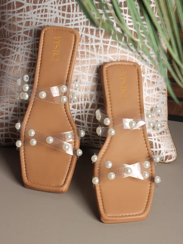 Elegant_slip-on_sandals_with_pearl-studded_soft_padded_insole,_and_large_decorative_front.