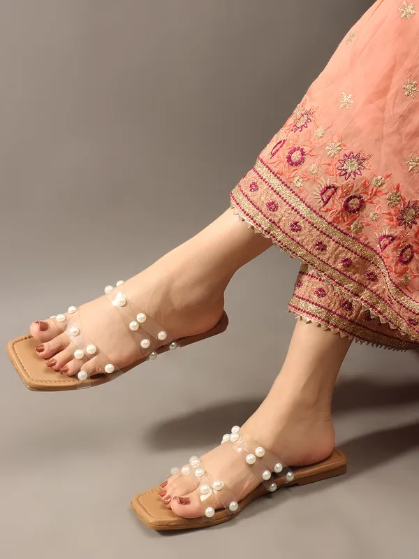 Elegant_slip-on_sandals_with_pearl-studded_soft_padded_insole,_and_large_decorative_front.