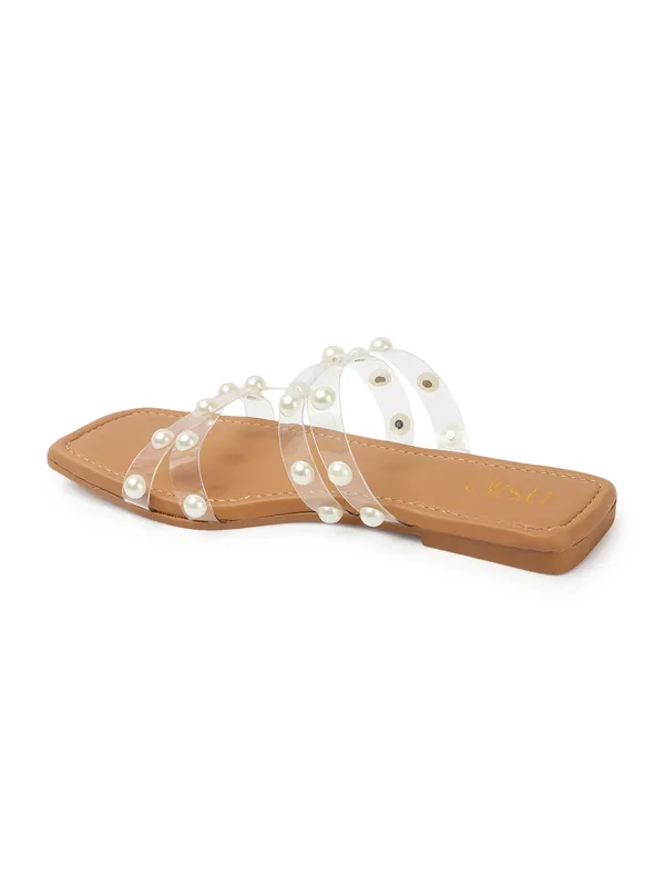 Elegant_slip-on_sandals_with_pearl-studded_soft_padded_insole,_and_large_decorative_front.