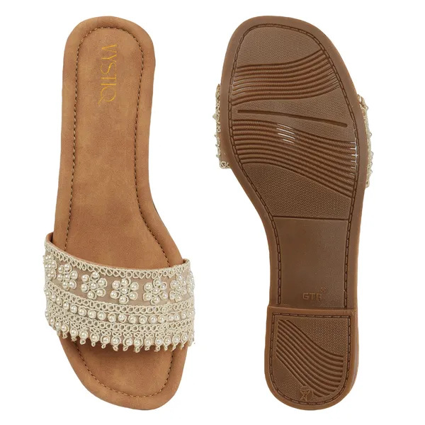 Elegant_slip-on_sandals_with_pearl-studded,_soft_padded_insole,_and_large_decorative_front.Name
