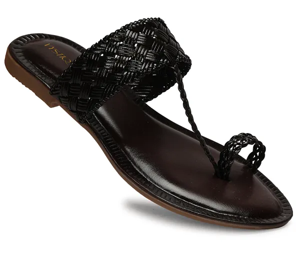 A_pair_of_stylish_women�s_slip-on_loafers_in_a_warm_tan/brown_color_with_a_subtle_ribbed_texture.