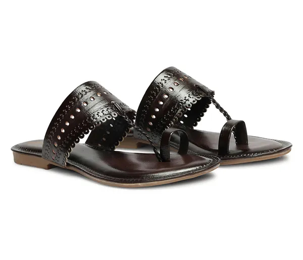 A_pair_of_stylish_women�s_slip-on_loafers_in_a_warm_tan/brown_color_with_a_subtle_ribbed_texture.