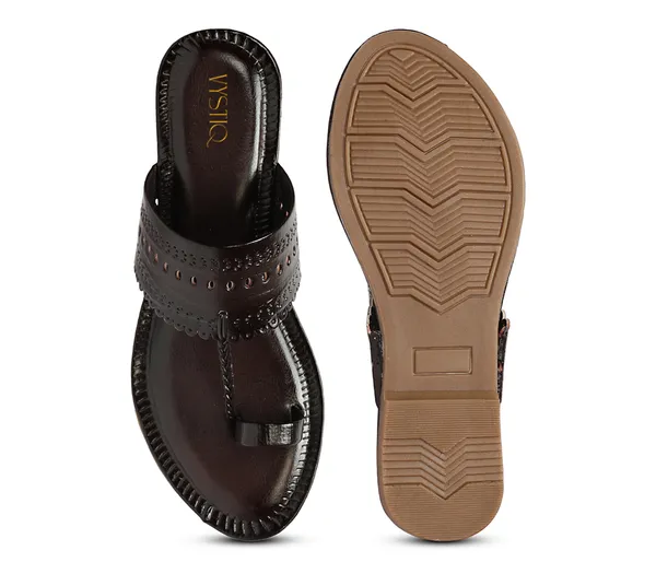 A_pair_of_stylish_women�s_slip-on_loafers_in_a_warm_tan/brown_color_with_a_subtle_ribbed_texture.