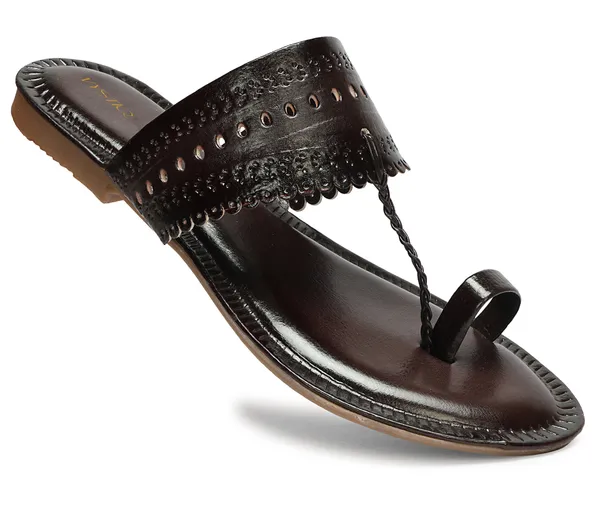 A_pair_of_stylish_women�s_slip-on_loafers_in_a_warm_tan/brown_color_with_a_subtle_ribbed_texture.