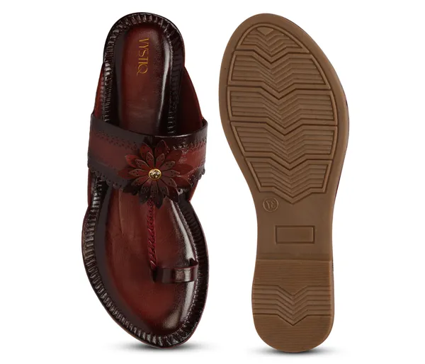 A_pair_of_stylish_women�s_slip-on_loafers_in_a_warm_tan/brown_color_with_a_subtle_ribbed_texture.
