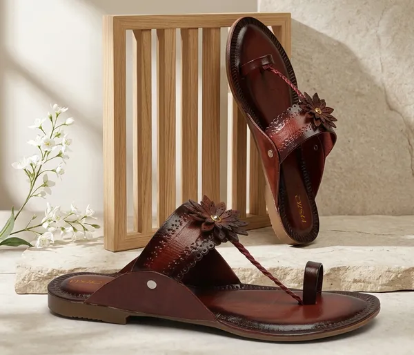 A_pair_of_stylish_women�s_slip-on_loafers_in_a_warm_tan/brown_color_with_a_subtle_ribbed_texture.