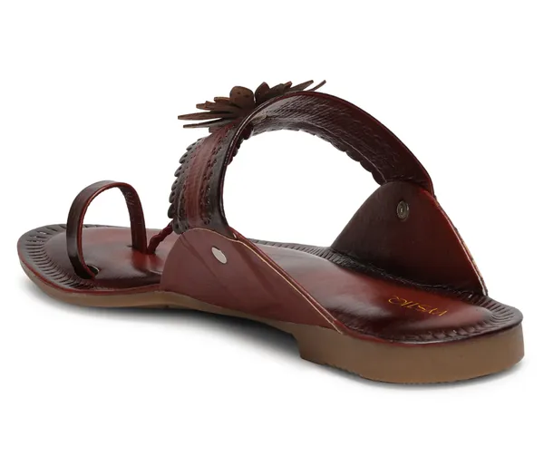 A_pair_of_stylish_women�s_slip-on_loafers_in_a_warm_tan/brown_color_with_a_subtle_ribbed_texture.