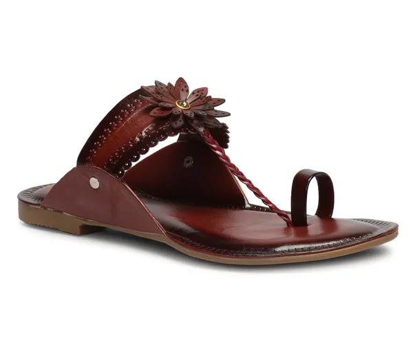 A_pair_of_stylish_women�s_slip-on_loafers_in_a_warm_tan/brown_color_with_a_subtle_ribbed_texture.