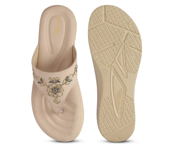 A_pair_of_stylish_women�s_slip-on_loafers_in_a_warm_tan/brown_color_with_a_subtle_ribbed_texture.