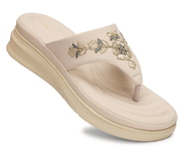 A_pair_of_stylish_women�s_slip-on_loafers_in_a_warm_tan/brown_color_with_a_subtle_ribbed_texture.